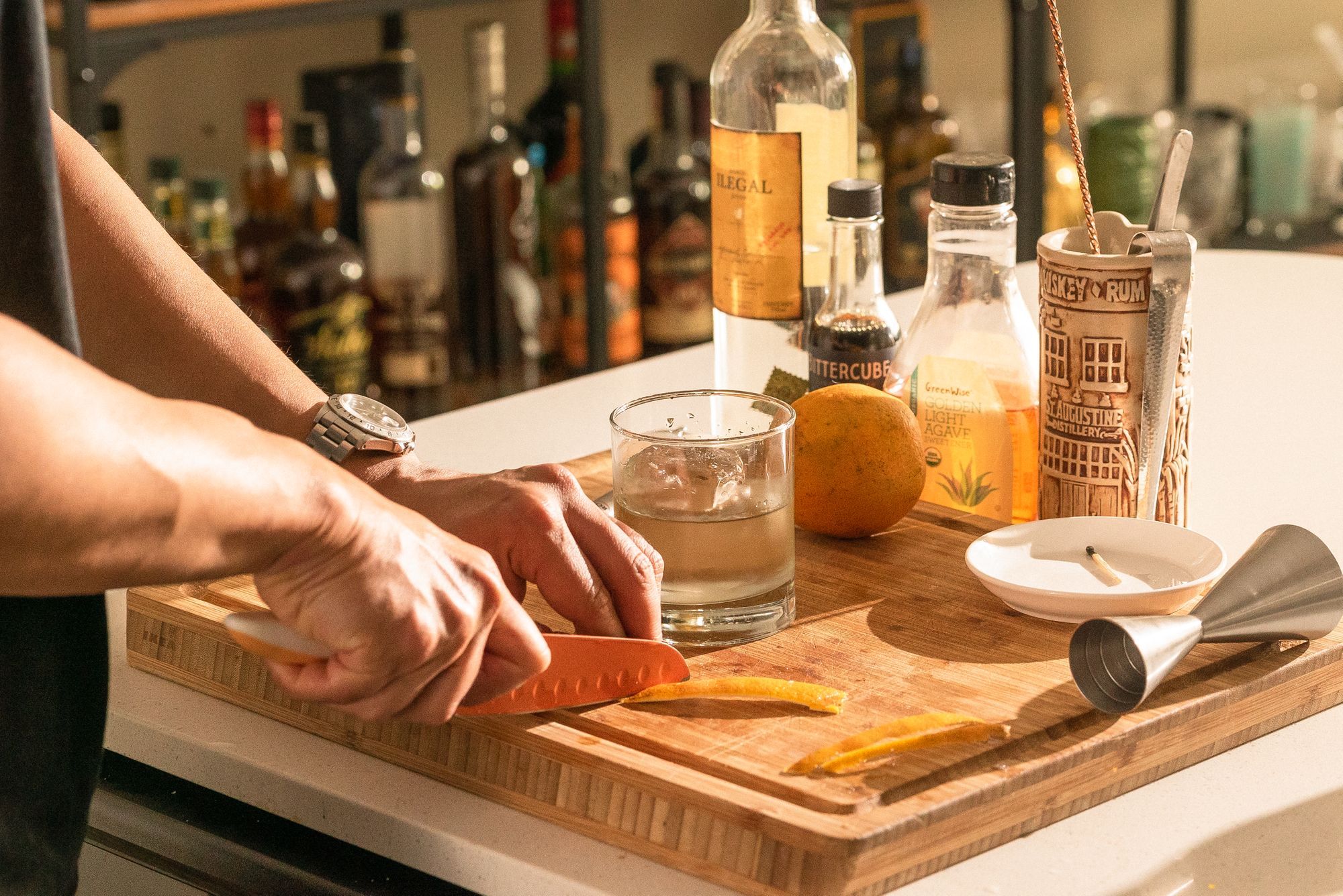 trimming orange peel with knife
